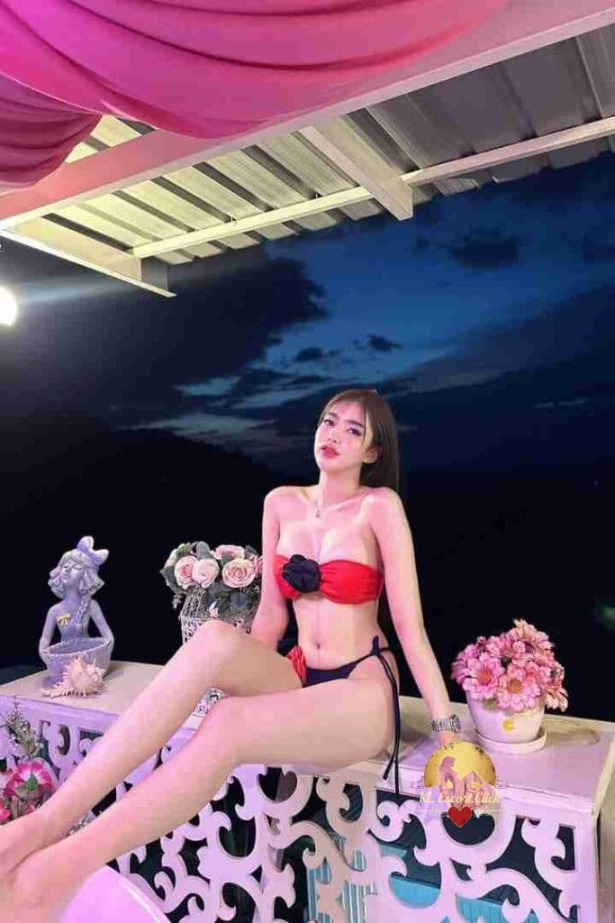 KL Escort Girl Woman in black lingerie and glasses poses in front of curtains. Sex Call Girl